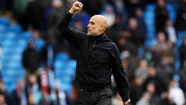 <p>Pep Guardiola will be a West Ham fan on Sunday. Pic: Martin Rickett/PA</p>