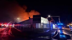 <p>No casualties have been reported, however the building has been extensively damaged and fire service operations continue at the site this morning. Photo: Waterford City and County Council</p>