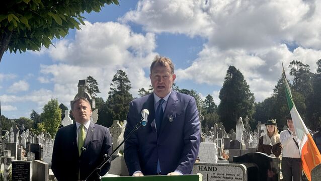 <p>Minister for Justice Jim O’Callaghan at Fianna Fáil’s annual Sean Lemass Commemoration on Sunday, May 10 2026. At the graveside of the former Taoiseach in Deansgrange Cemetery, Dun Laoghaire. (Bairbre Holmes/PA)</p>