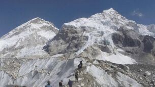 <p>ALL IN: International trekkers pass through a glacier at the Mount Everest base camp, Nepal. Pic: AP Photo/Tashi Sherpa, file</p> <p>ALL IN: International trekkers pass through a glacier at the Mount Everest base camp, Nepal. Pic: AP Photo/Tashi Sherpa, file</p>