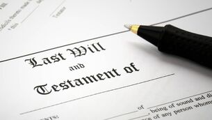 iStock-875284846.jpg Signing Last Will & Testament