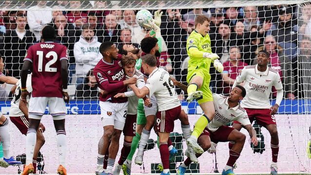 <p>Arsenal goalkeeper David Raya (centre left) was adjudged to have been fouled by West Ham’s Pablo in what could be a huge moment in the Premier League title race. Pic: John Walton/PA</p>