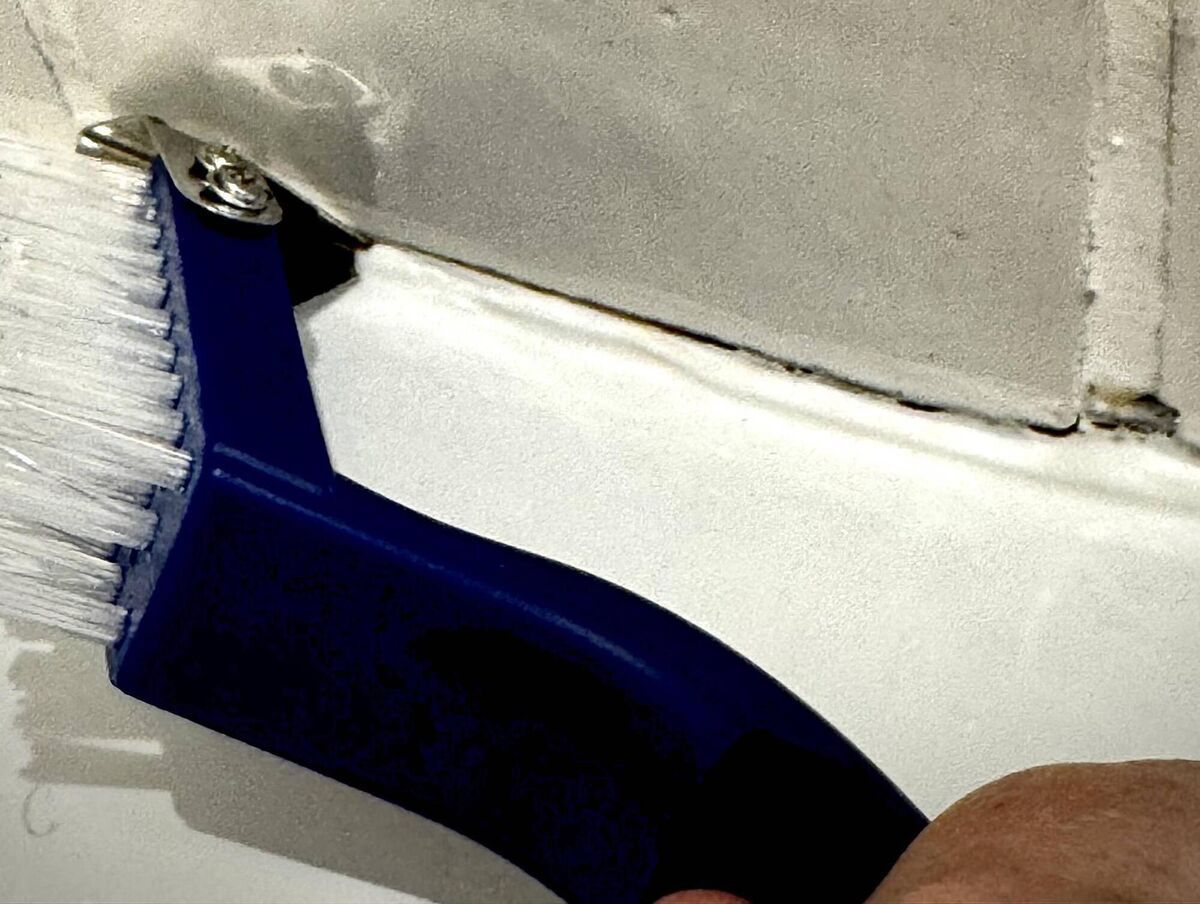 Silicone-remover tool in action.