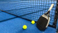 padel tennis racket sport court and balls.