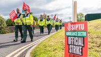 Nationwide ambulance 24-hour strike begins as paramedics demand pay recognition