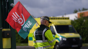 Members of Siptu and Unite unions on the picket line outside National Ambulance Service depot in Dublin South Central (Niall Carson/PA) Members of Siptu and Unite unions on the picket line outside National Ambulance Service depot in Dublin South Central (Niall Carson/PA)