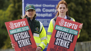 <p>Paramedics joined the strike on the picket line as members protest over pay and conditions (Liam McBurney/PA)</p>
