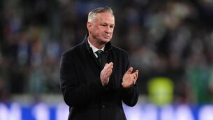 <p>Northern Ireland manager Michael O'Neill applauds the fans.</p>