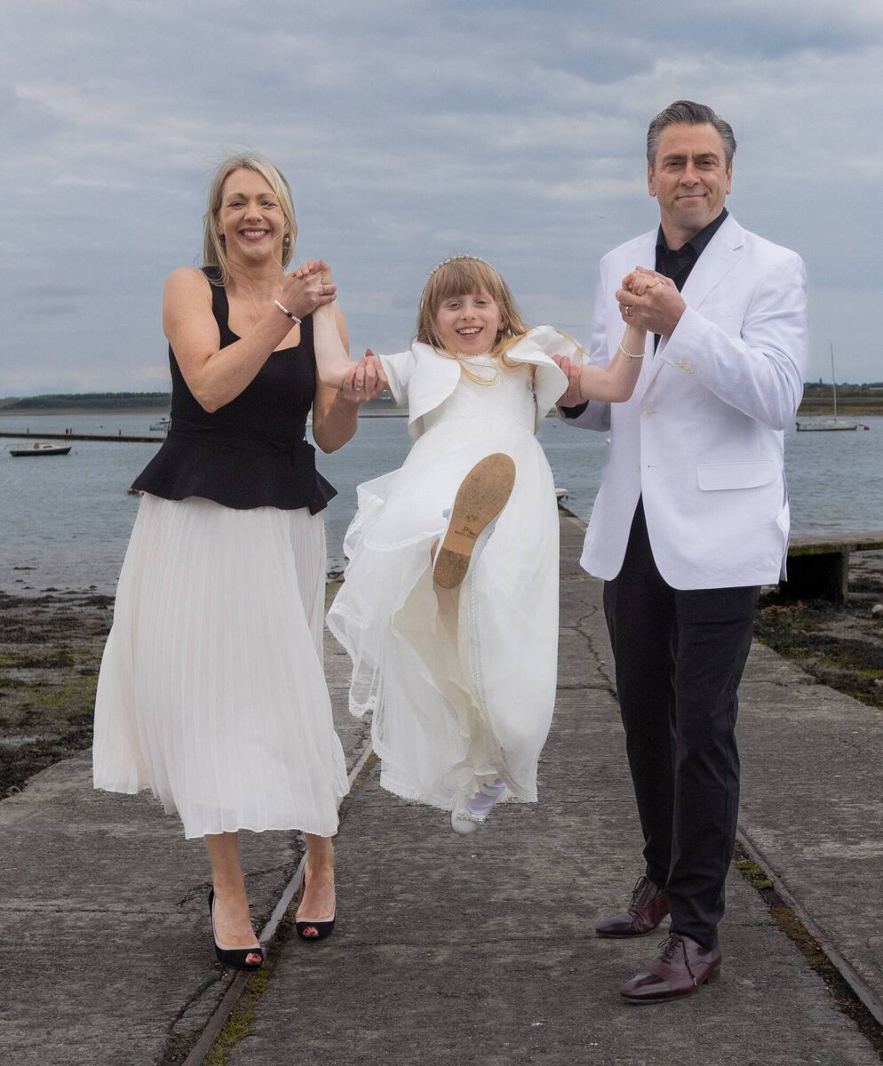 Erica and Richard Hogan with daughter Sophie at her first Holy Communion. Erica and Richard Hogan with daughter Sophie at her first Holy Communion.