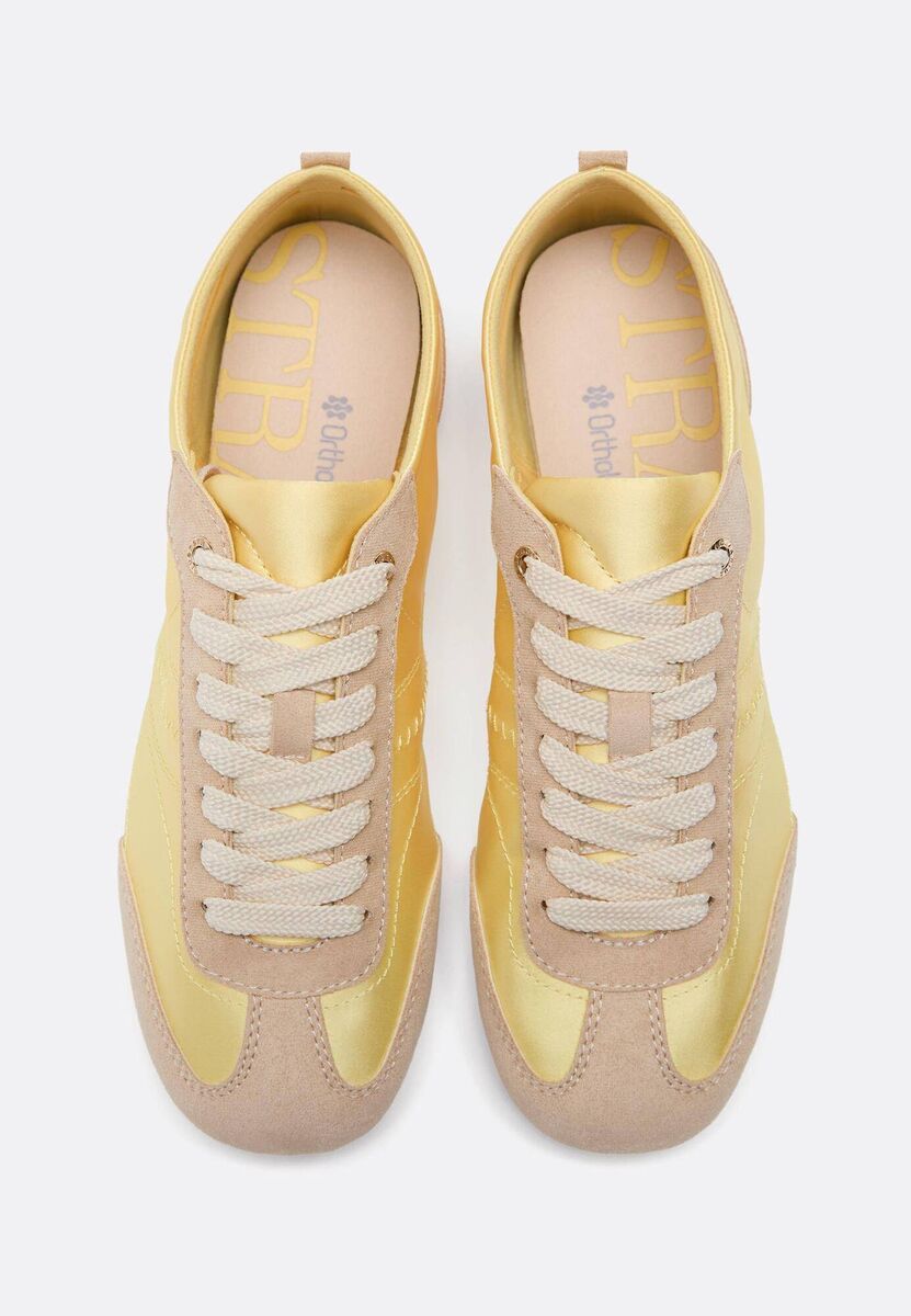 Yellow Satin Trainers, €29.99, Stradivarius.