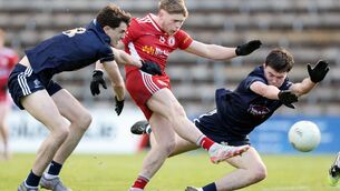 <p>BACK TO THE FINAL: Tyrone's Shea McDermott scores a goal despite Evan Boyle and Cian McKevitt. Pic: ©INPHO/Laszlo Geczo</p>