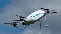 Manna Aero drone is seen as it delivers essential household and medical supplies in the Irish village of Moneygall