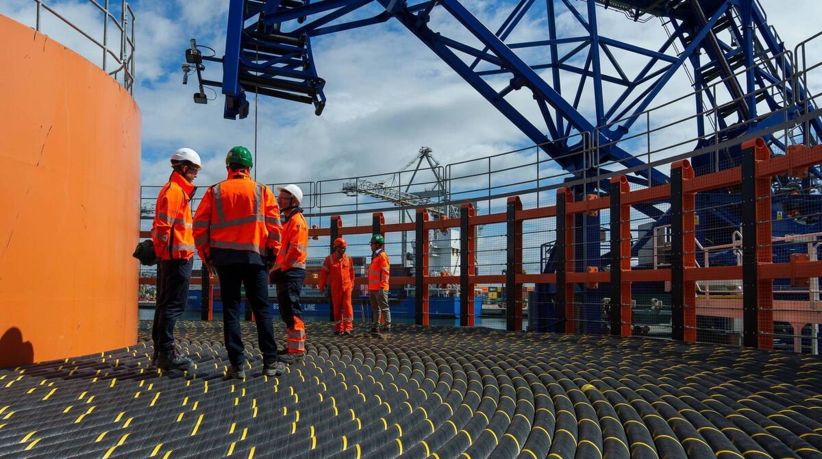 EirGrid representatives onboard the cable laying vessel Calypso. EirGrid representatives onboard the cable laying vessel Calypso.
