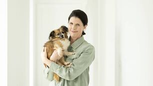 <p>Ciara O'Connor, author of new children's book The Skidderwolves with her dog Gwen. </p>