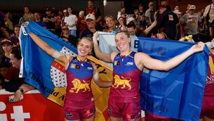 <p>Orla O'Dwyer and Jennifer Dunne of the Lions celebrate after the 2024 AFLW Second Preliminary Final with Adelaide Crows Photo by Michael Willson/AFL Photos via Getty Images)</p>
