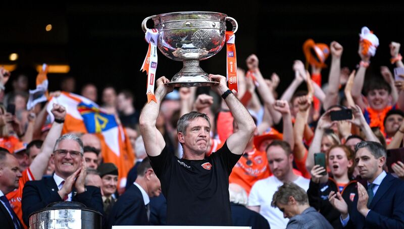 Armagh manager Kieran McGeeney lifts the Sam Maguire. Pic: Ramsey Cardy/Sportsfile.