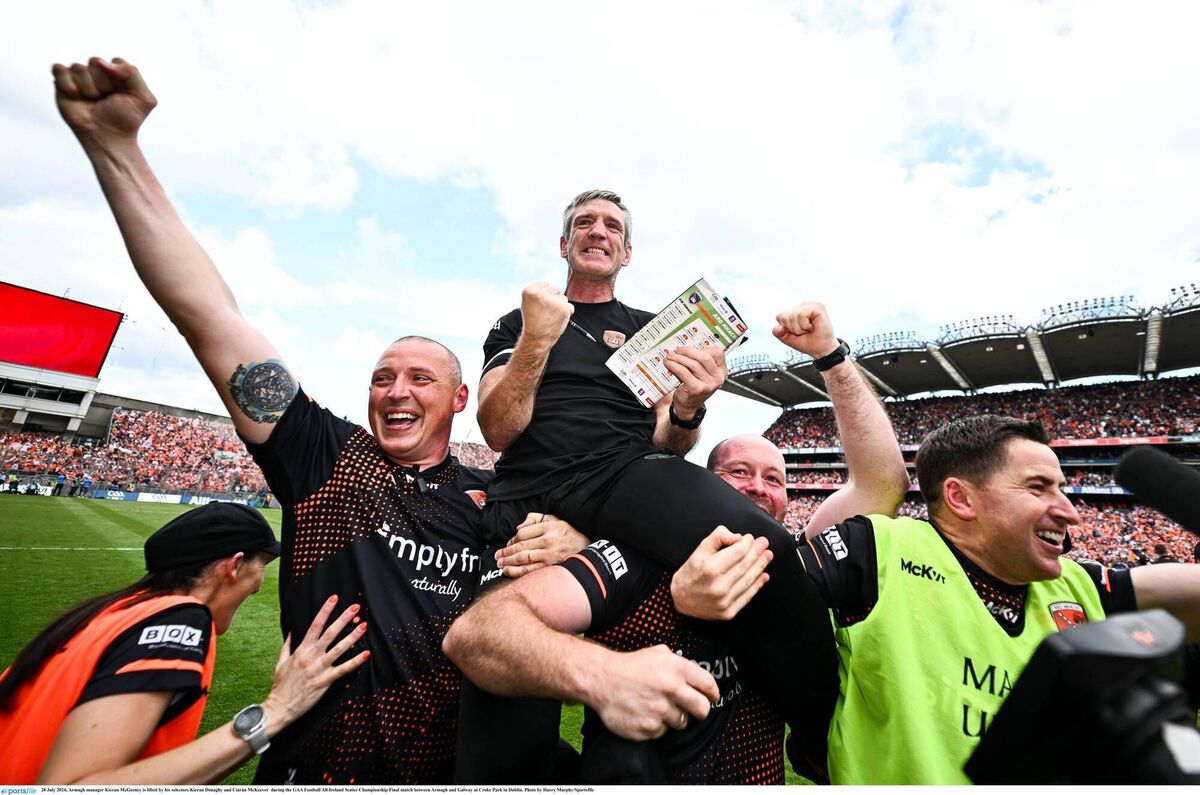 WINNER: Armagh manager Kieran McGeeney is lifted by his selectors Kieran Donaghy, Ciarán McKeever and Conleth Gilligan after their side's v2024 All-Ireland win against Galway in Croke Park. Pic: Harry Murphy/Sportsfile
