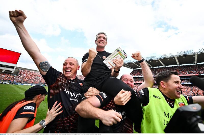 WINNER: Armagh manager Kieran McGeeney is lifted by his selectors Kieran Donaghy, Ciarán McKeever and Conleth Gilligan after their side's v2024 All-Ireland win against Galway in Croke Park. Pic: Harry Murphy/Sportsfile