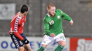 <p>YOUNG AND GREEN: Terry Dixon in action against Levon Airapetian, Armenia in a UEFA European U21 Championship qualifier in Tallaght Pic: Ray Lohan / SPORTSFILE</p>