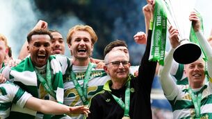 <p>ONCE MORE WITH FEELING: Celtic manager Martin O'Neill with the Scottish Premier League trophy following his side's title deciding match against Heart of Midlothian at Celtic Park. Pic: Andrew Milligan/PA Wire.</p> <p>ONCE MORE WITH FEELING: Celtic manager Martin O'Neill with the Scottish Premier League trophy following his side's title deciding match against Heart of Midlothian at Celtic Park. Pic: Andrew Milligan/PA Wire.</p>