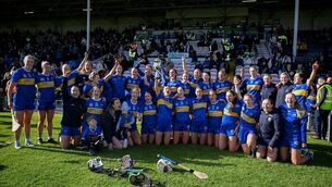 <p>TIPP TOP: Tipperary captain Caoimhe McCarthy and her teammates with the cup after the Munster Senior Camogie Championship final against Waterford at FBD Semple Stadium in Thurles. [ic: Ray McManus/Sportsfile</p>