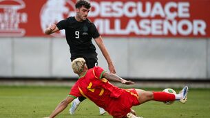 <p>HAT-TRICK HERO: The Republic of Ireland's Tom Cannon has a shot on goal despite the tackle of Kayden Harrack of Grenada. Pic: Stephen McCarthy/Sportsfile</p>