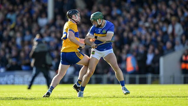 <p>Tony Kelly of Clare and Robert Doyle of Tipperary jostle before the start the Munster GAA Senior Hurling Championship Round 4 match between Tipperary and Clare at FBD Semple Stadium in Thurles, Tipperary. Photo by Ray McManus/Sportsfile</p>