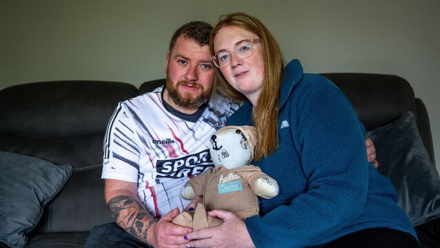 <p>Jason and Amy Barry holding a teddy bear made from clothes bought in preparation for the arrival of their son Connie. Picture: Chani Anderson</p>