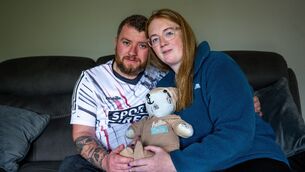 <p>Jason and Amy Barry holding a teddy bear made from clothes bought in preparation for the arrival of their son Connie. Picture: Chani Anderson</p>