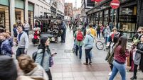 Crowd on Grafton Street in Dublin during day of autumn