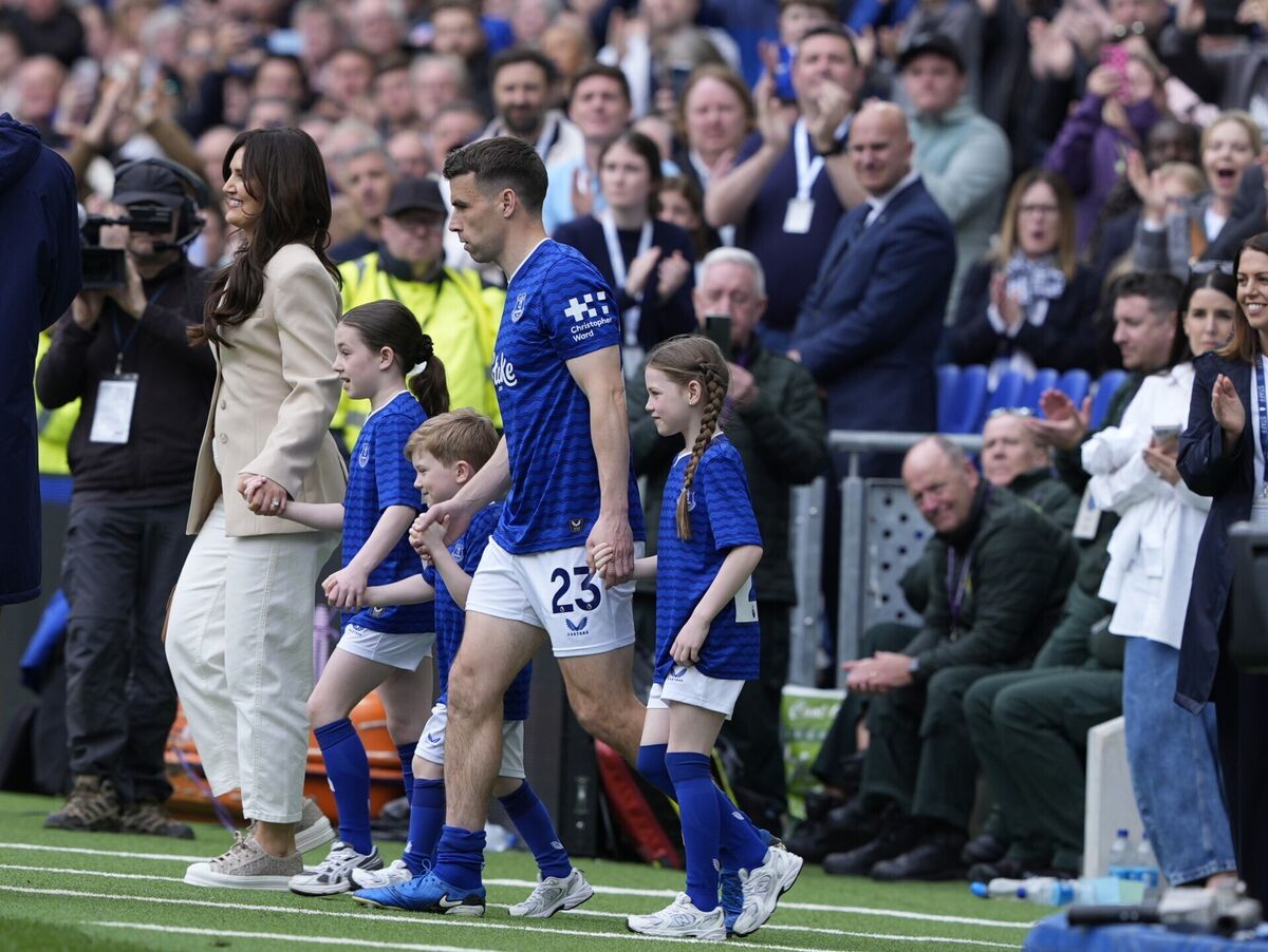 Seamus Coleman with his wife Rachel Cunningham and children on the pitch after his final home game for Everton. Pic: Peter Byrne/PA Wire.