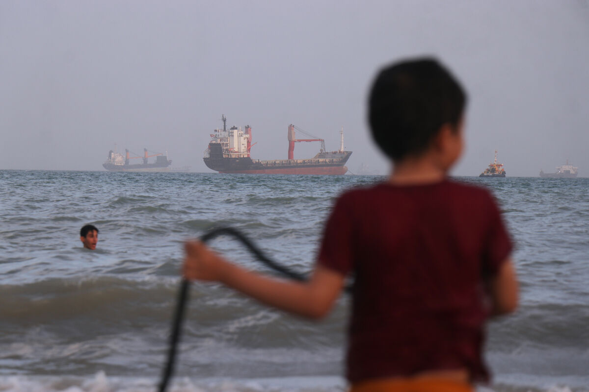Bulk carriers, cargo ships, and service vessels sit offshore in the Strait of Hormuz in April 26. The fragile ceasefire with Iran may pause the violence for now, but it does not alter the underlying incentives driving the conflict. Picture: Razieh Poudat/ISNA via AP Bulk carriers, cargo ships, and service vessels sit offshore in the Strait of Hormuz in April 26. The fragile ceasefire with Iran may pause the violence for now, but it does not alter the underlying incentives driving the conflict. Picture: Razieh Poudat/ISNA via AP
