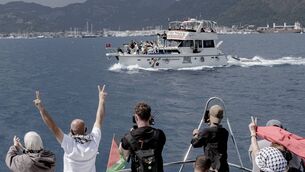 <p>People raise V-signs and take photos from a boat decorated with Palestinian flags as another vessel displaying solidarity signs sails past near the port in Marmaris, Turkey, on May 14, 2026. Photo by Murat Kocabas / Middle East Images / AFP via Getty Images.</p> <p>People raise V-signs and take photos from a boat decorated with Palestinian flags as another vessel displaying solidarity signs sails past near the port in Marmaris, Turkey, on May 14, 2026. Photo by Murat Kocabas / Middle East Images / AFP via Getty Images.</p>