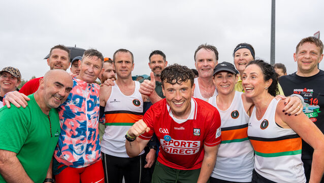 <p>Jordan Adams of the FTD Brothers Foundations pictured with members of the St Finnbar's Athletic Club after finishing the Cork marathon, no. 23 out of the 33 he and his brother Cian are completeing around Ireland. Their marathon around Cork city began and ended at Tramore Valley Park. Picture by Noel Sweeney</p>