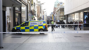 <p>Gardaí cordon off a section of Henry Street in front of Arnott’s on Friday. Picture: Sam Boal/Collins Photos</p>