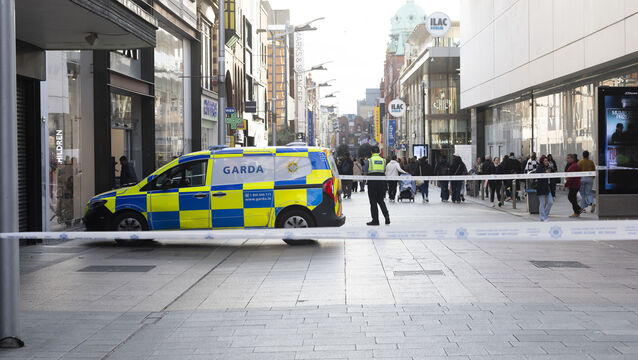 <p>Gardaí cordon off a section of Henry Street in front of Arnott’s on Friday. Picture: Sam Boal/Collins Photos</p>