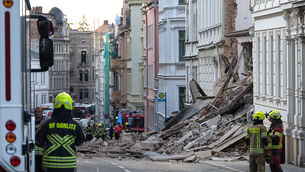 Police and firefighters near a collapsed house in the city centre of Gorlitz, Germany (Paul Glaser/dpa via AP) Police and firefighters near a collapsed house in the city centre of Gorlitz, Germany (Paul Glaser/dpa via AP)