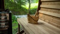 Wooden sauna bucket in sauna