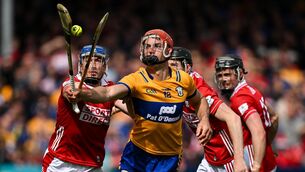 <p>ROUND 5, DING DING: Peter Duggan in action against Cork players Seán O’Donoghue, Eoin Downey and Darragh Fitzgibbon. Pic: Brendan Moran/Sportsfile</p>