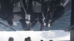 Divers preparing to search for the four missing Italians (Maldives President’s Media Division via AP)