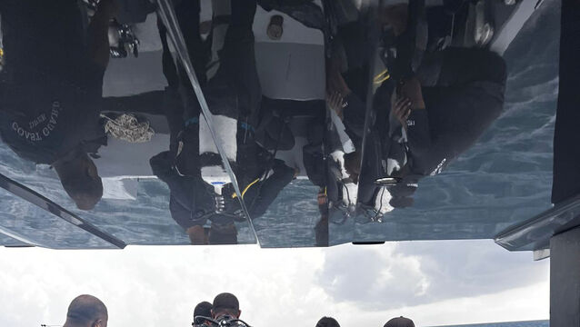 Divers preparing to search for the four missing Italians (Maldives President’s Media Division via AP) Divers preparing to search for the four missing Italians (Maldives President’s Media Division via AP)