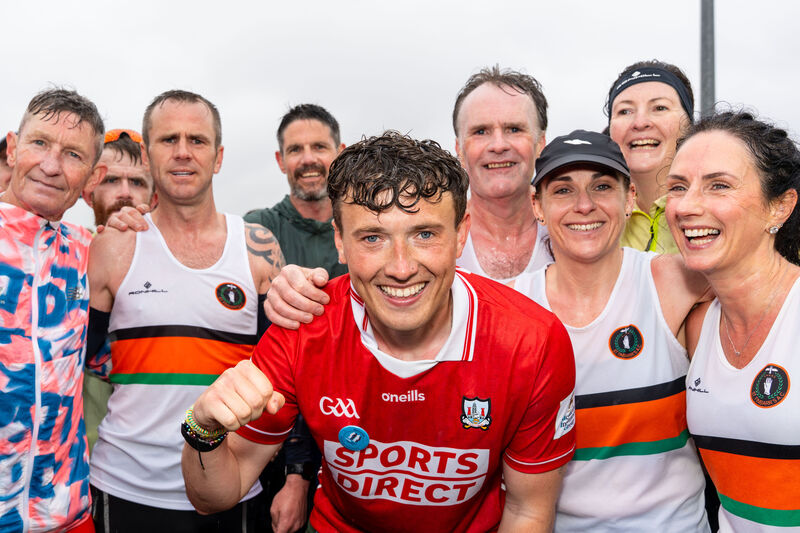 Jordan Adams of the FTD Brothers Foundations pictured with members of the St Finnbar's Athletic Club after finishing the Cork marathon, number 23 out of the 33 he and his brother Cian are completing around Ireland. Picture: Noel Sweeney Jordan Adams of the FTD Brothers Foundations pictured with members of the St Finnbar's Athletic Club after finishing the Cork marathon, number 23 out of the 33 he and his brother Cian are completing around Ireland. Picture: Noel Sweeney