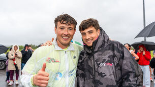 <p>Jordan Adams and his brother Cian pictured in Cork, where Jordan completed his 23rd marathon in 23 days. Picture: Noel Sweeney</p>