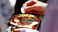 CommunionGettyImagesMay202.jpg Pope Benedict XVI Celebrates Mass At Nationals Stadium