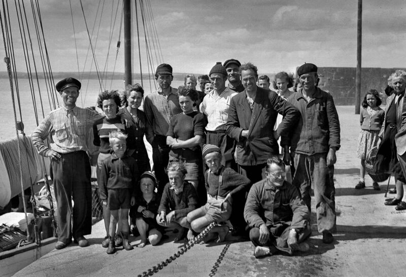 Walter Kunath and other refugees on Ballycotton pier in East Cork having sailed from Germany on board the Sea Wolf in June 1951. Picture: Irish Examiner Archive Walter Kunath and other refugees on Ballycotton pier in East Cork having sailed from Germany on board the Sea Wolf in June 1951. Picture: Irish Examiner Archive