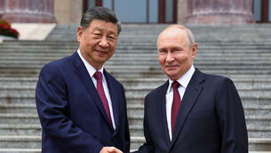 Vladimir Putin and Xi Jinping (Alexander Kazakov, Sputnik, Kremlin Pool Photo via AP)