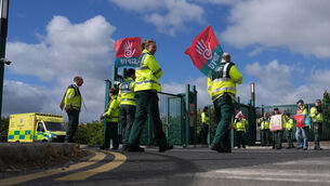 <p>Members of Siptu and Unite unions on the picket line outside National Ambulance Service (Dublin South Central) depot at Davitt Road in Dublin, as paramedics go on strike. </p>
