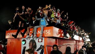 <p>Arsenal fans celebrate at the Emirates Stadium after the club was crowned Premier League champions for the first time in 22 years. Pic: Jeff Moore/PA Wire.</p> <p>Arsenal fans celebrate at the Emirates Stadium after the club was crowned Premier League champions for the first time in 22 years. Pic: Jeff Moore/PA Wire.</p>
