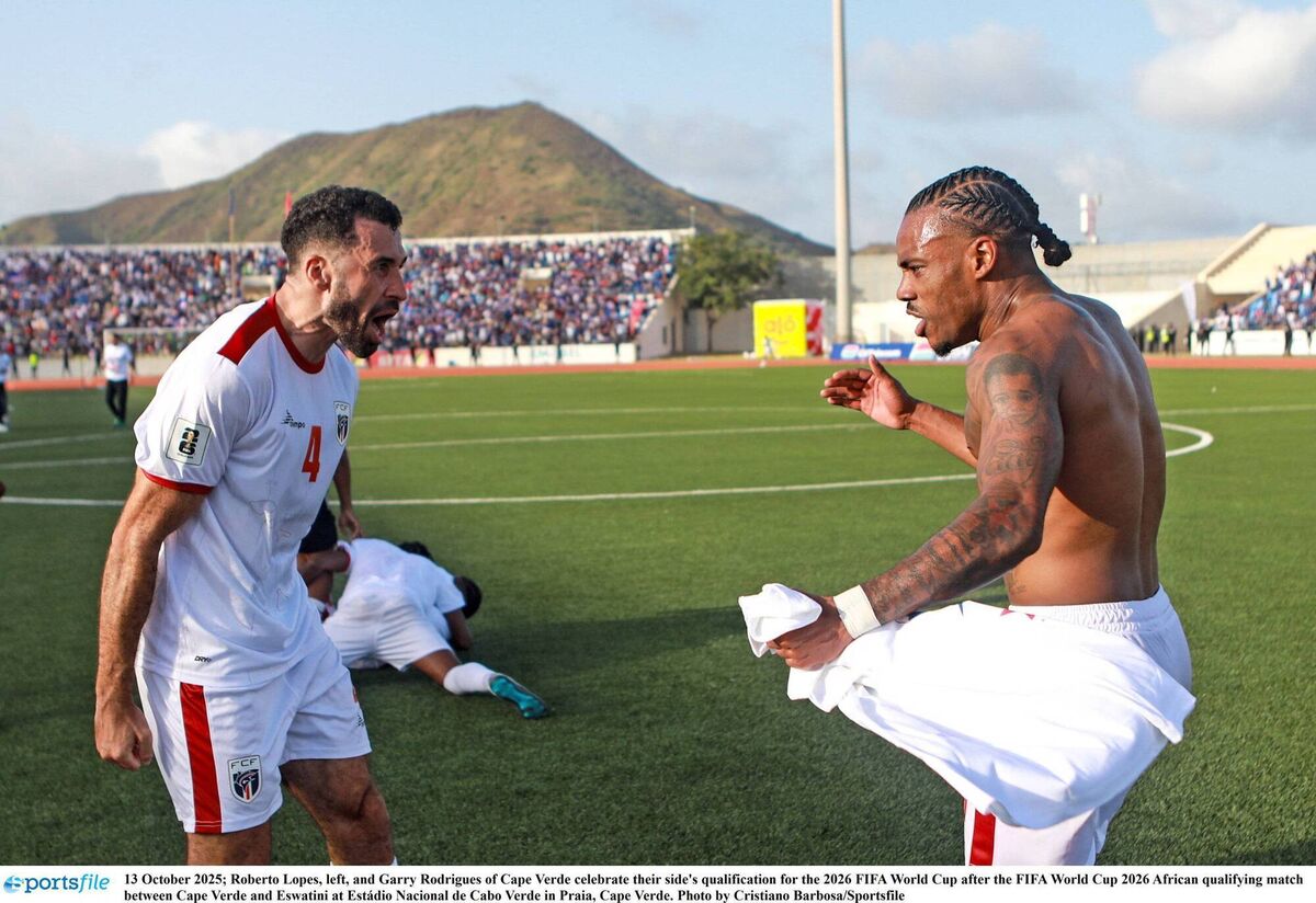 Roberto Lopes, left, and Garry Rodrigues of Cape Verde celebrate their side's qualification for the 2026 FIFA World Cup after the FIFA World Cup 2026 African qualifying match between Cape Verde and Eswatini at Estádio Nacional de Cabo Verde in Praia, Cape Verde. Photo by Cristiano Barbosa/Sportsfile