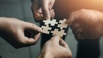 mobile jigsaw puzzle pieces business cooperation concept teamwork and cooperation Businessmen join a jigsaw team, charity, volun